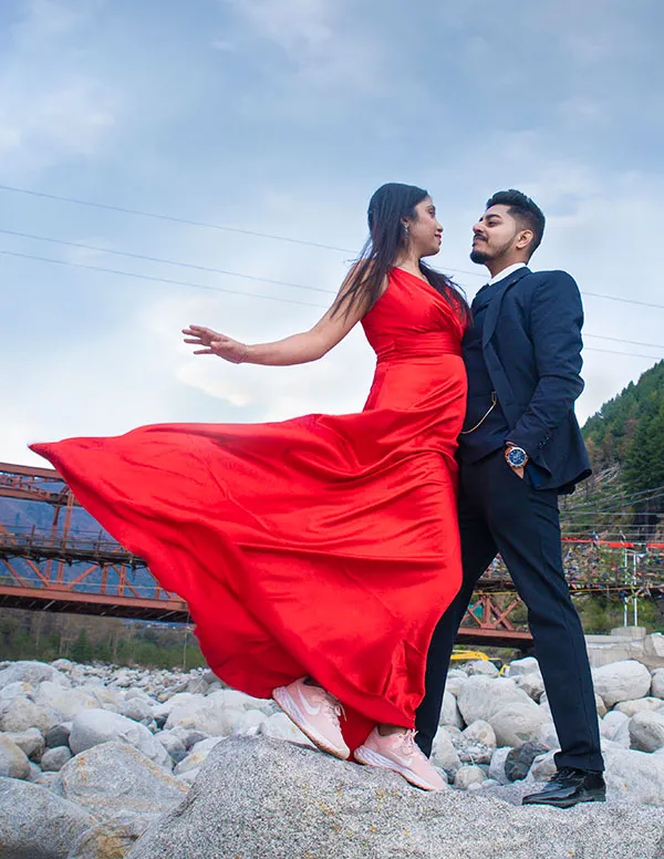 Couple enjoying a romantic pre-wedding photoshoot at an outdoor location from our pre-wedding photographer in Kolkata
